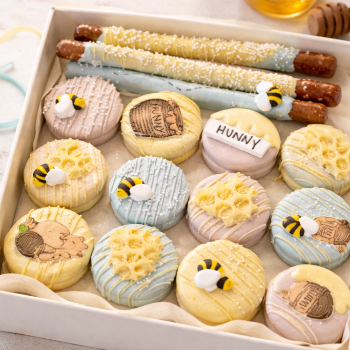 Decorated custom Winnie the Pooh chjocolate covered Oreos for baby shower in New Jersey